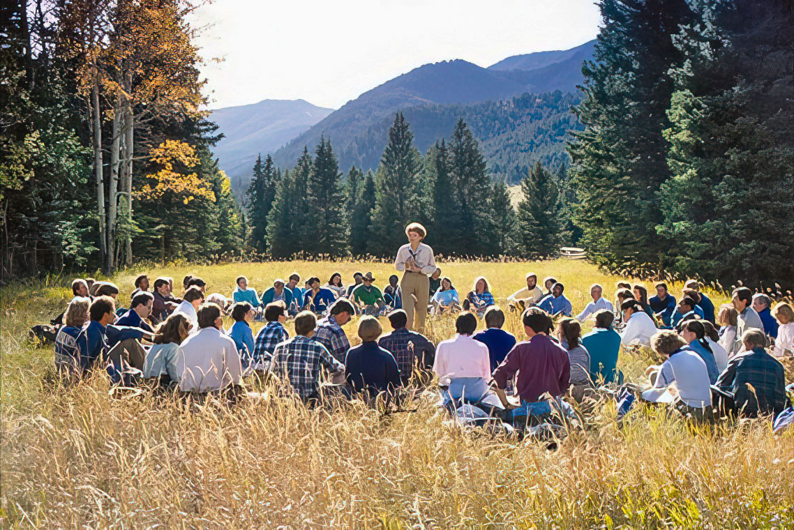 The messenger teaching Summit University in Mother Mary’s Meadow, near the Heart of the Inner Retreat